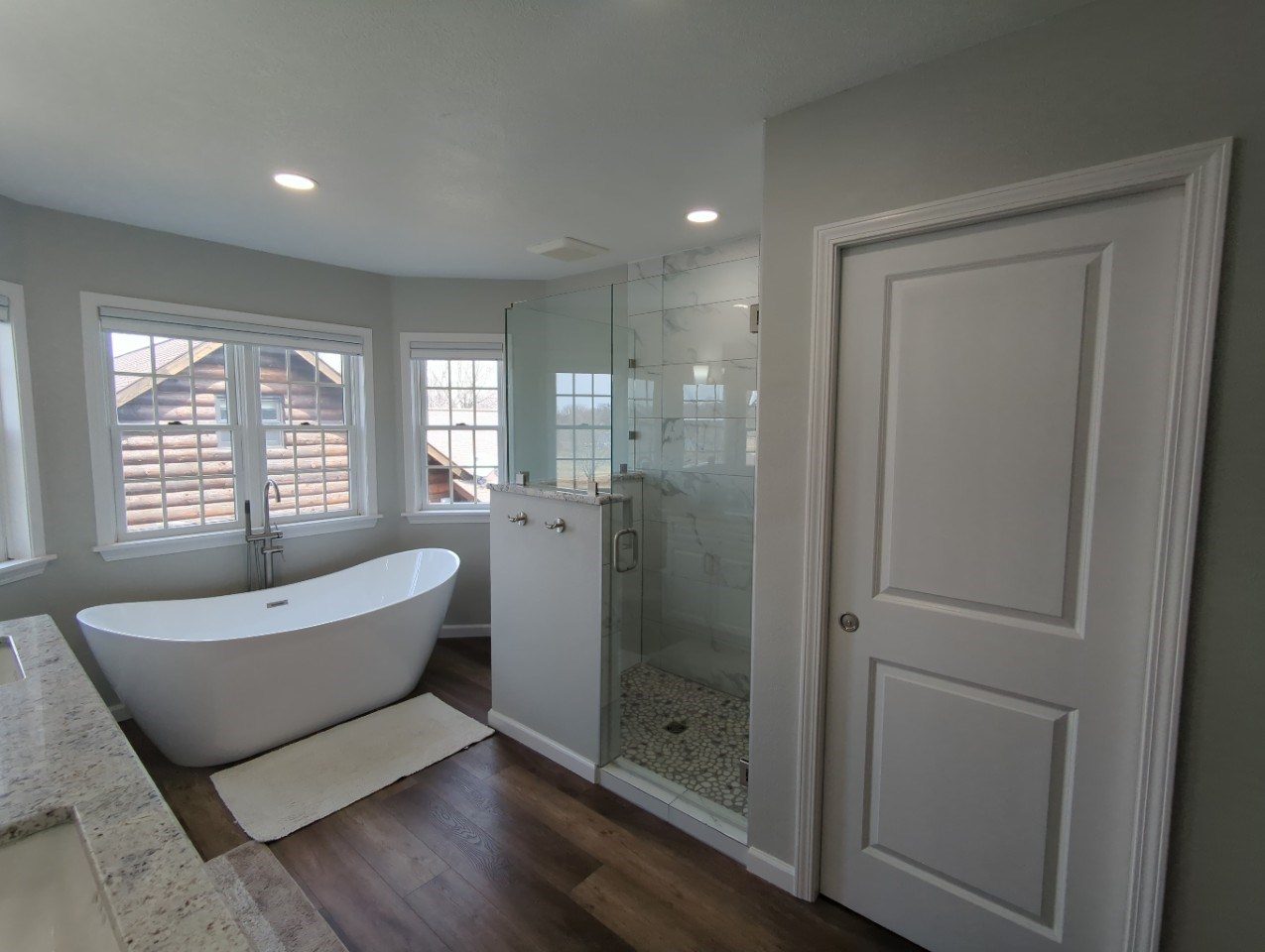 Spa-style bathroom with freestanding tub